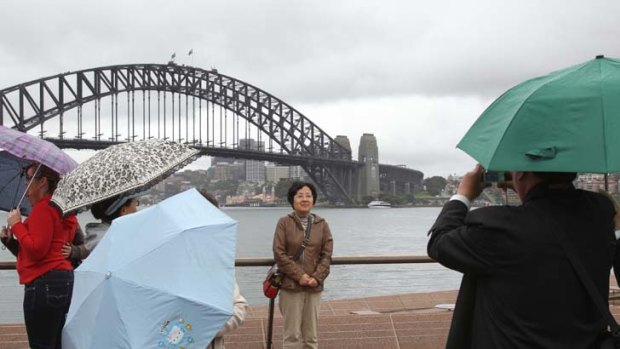 Dollar not a dampener ... despite the high dollar, tourists are arriving in record numbers.