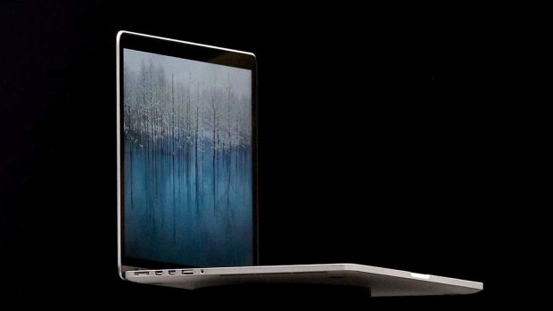 The new MacBook Pro is shown during the keynote address at the Apple 2012 World Wide Developers Conference (WWDC).