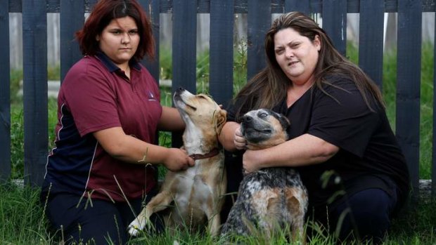 Concerns remain: Zekinthia Halge with her mother, Gail Sempel, and their family dogs Will and Roo.