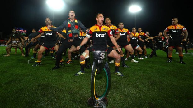 Aaron Cruden of the Chiefs leads a team haka to celebrate winning the Super Rugby title on Saturday.