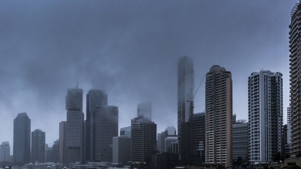 Rain falls on the Brisbane central business district.