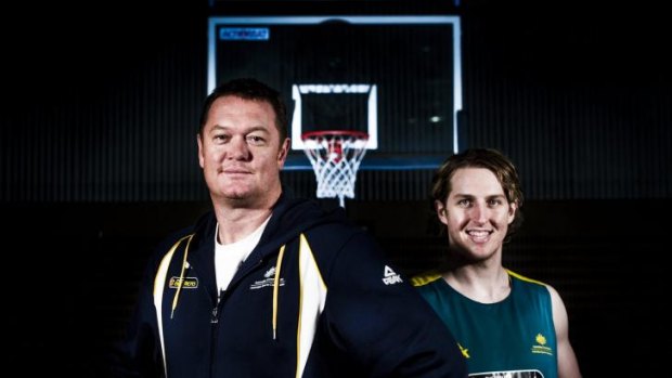 Boomers player Cameron Bairstow (right) has signed with the Chicago Bulls, where Australian assistant coach Luc Longley (left) won three NBA titles.