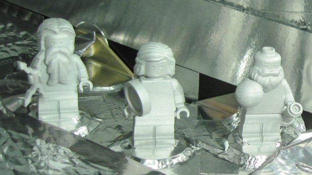 Three LEGO figurines representing the Roman god Jupiter, his wife Juno and Galileo Galilei are aboard the Juno spacecraft. 