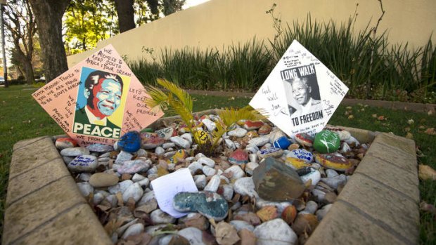 Messages for Nelson Mandela are pictured outside of his Johannesburg home.