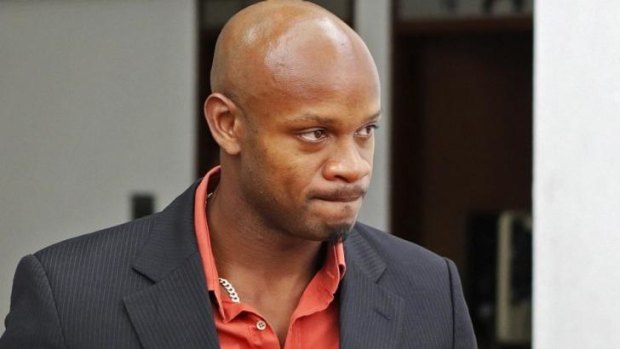 Asafa Powell, who tested positive for doping at the Jamaican Championships in 2013, on the first day of his hearing before the country's anti-doping commission in January, 2014.