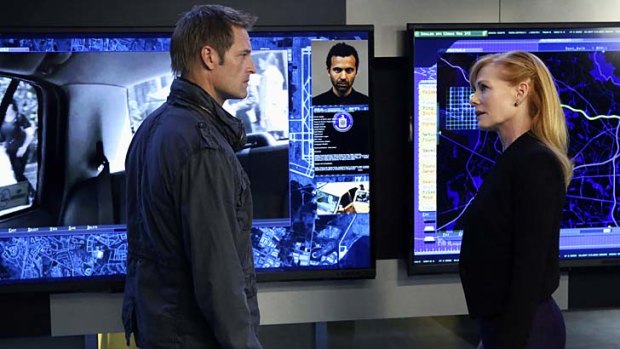 Marg Helgenberger and Josh Holloway in <em>Intelligence</em>.