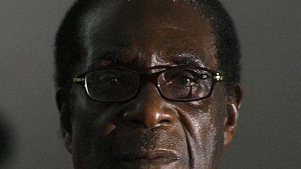 Lost his knighthood ... Robert Mugabe.