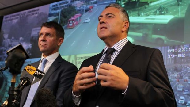 NSW Treasurer Mike Baird, left,  and Federal treasurer Joe Hockey speak ahead of the G20 Finance Ministers Meeting and Infrastructure at the Transport Management Centre, Eveleigh.