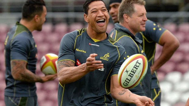 Winging it: Israel Folau training with the Wallabies at Ballymore Stadium in Brisbane on Thursday.