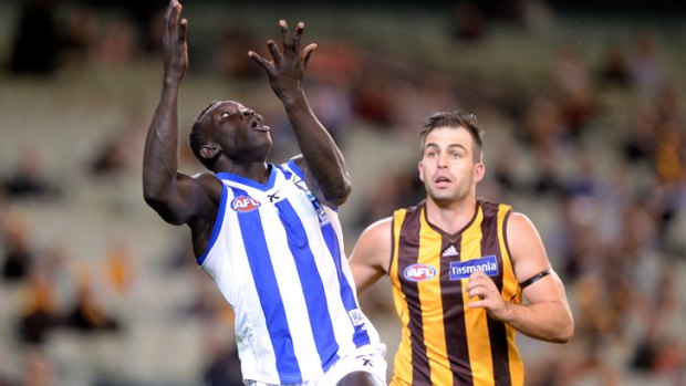 North Melbourne's Majak Daw and Hawthorn's Brian Lake on Saturday.