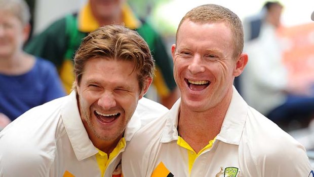 Australian opener Chris Rogers (right) shares a laugh with teammate Shane Watson as they prepare for the Gabba Test.