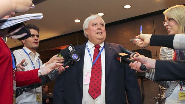 Mining magnate Clive Palmer as some fun with the media at the LNP Convention in Brisbane.