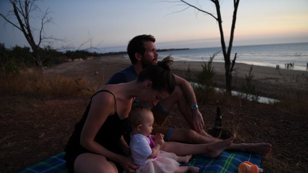 Bethan and Johhny McElwee watch the sun set at Dripstone Cliffs in Darwin on Aviana's first birthday. 