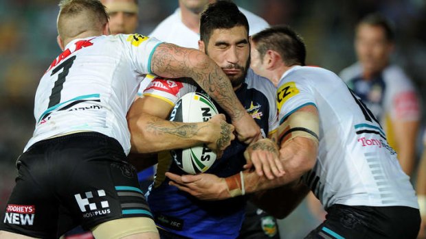 James Tamou does the hard yards for the Cowboys on a night when he ran 199 metres against the Panthers.