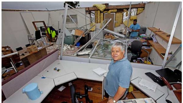 Chris Tsiavis in his flooded Laverton office.