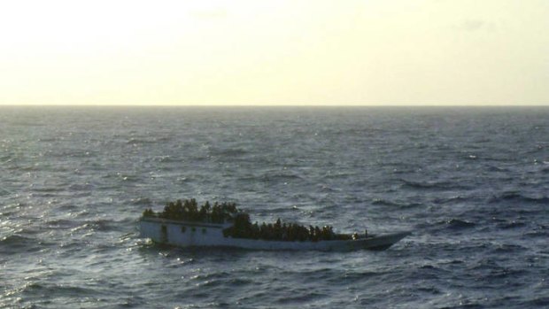 A picture released by the Australian Maritime and Safety Authority shows a boat which according to the AMSA was taken mid-morning before the boat sank near Christmas Island.
