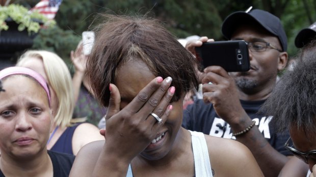 Diamond Reynolds, the girlfriend of Philando Castile, cries outside the governor's residence in St Paul, Minnesota.
