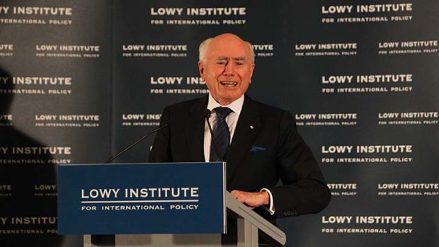 'Necessitated a 100 per cent ally': John Howard said Australia was obliged to follow the US into the 2003 Iraq war.