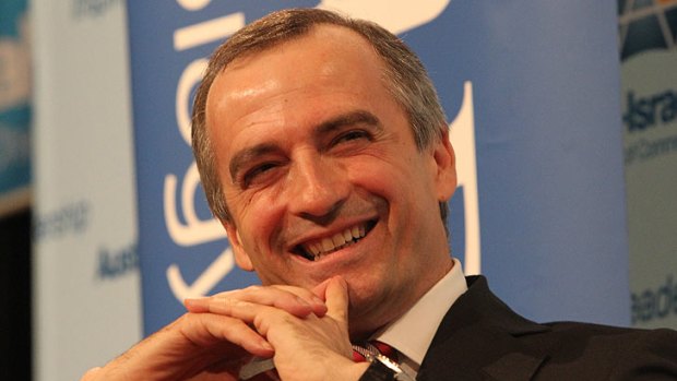 A smiling John Borghetti addresses a business luncheon in Sydney.
