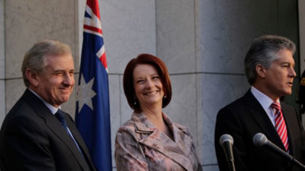 Old faces, new team ... the Minister for Education, Simon Crean, with Julia Gillard and Stephen Smith.