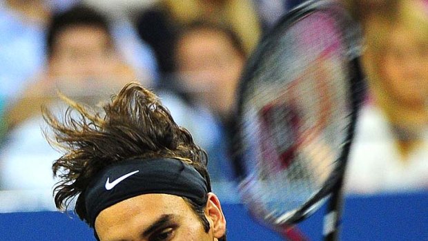 Roger Federer is through to the second round of the US Open.