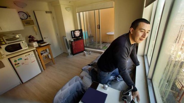 Peter Truong is happy living in his tiny studio apartment on Flinders Street.