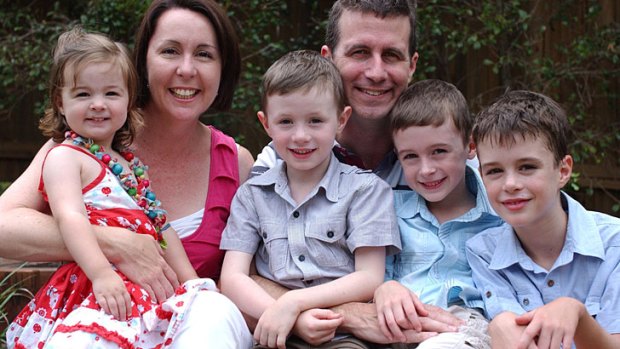 <i>Sunday Night</i> ... Amputee Matthew Ames with his wife Diane, and their three sons and young daughter.