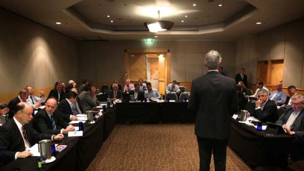 Chairmen and chief executives of all 16 clubs sit down to business with NRL chief executive David Gallop at the Crowne Plaza in Coogee yesterday.