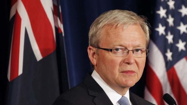 Going back ... Australian Foreign Minister Kevin Rudd is tempted at the prospect of vindication but not sure he wants the responsibility of trying to rescue a dying government.