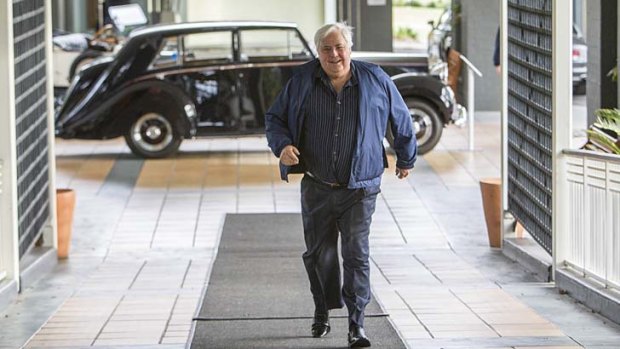 Clive Palmer arriving at his resort at Coolum.
