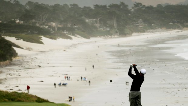 Playing hard ball: Tiger Woods practises at Pebble Beach ahead of his successful 2000 US Open tilt.