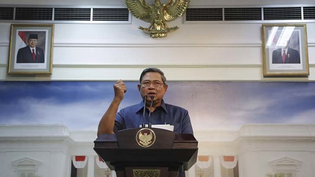 Not happy, Tony: President Susilo Bambang Yudhoyono makes a gesture during a press conference in Jakarta. Indonesia has recalled its ambassador from Australia.