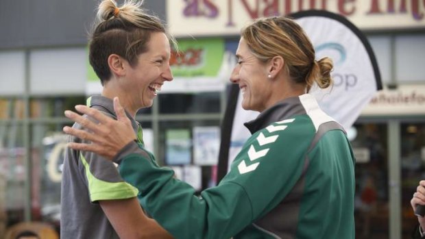 Canberra United player Sally Shipard is greeted by coach Elisabeth Migchelsen as the players are named in the 2013/ 14 Canberra United team.