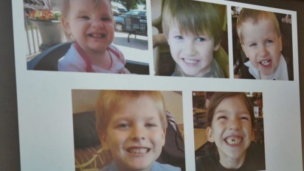 Photos of Timothy Ray Jones Jr's children on display during the sheriffs  briefing in Lexington.