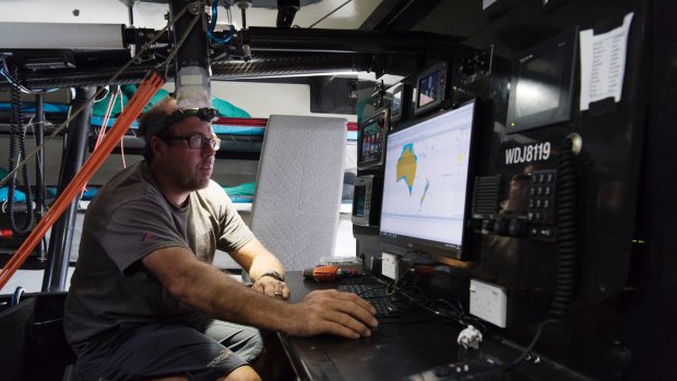 As navigator, Artie Means spends the majority of the race staring at screens on his work bench
