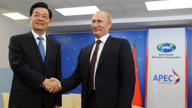 Russian President Vladimir Putin, right, meets with Chinese President Hu Jintao during the APEC summit in Vladivostok.