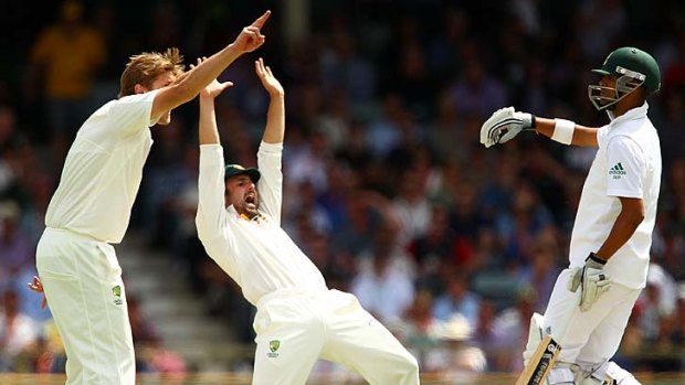 Let it be so ... Shane Watson and Ed Cowan appeal for the wicket of Faf de Plessis.