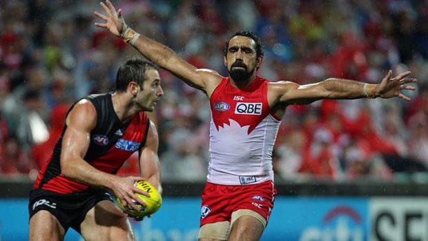 The man: Sydney's Adam Goodes keeps Essendon captain Jobe Watson at bay during the Swans' win at the SCG.