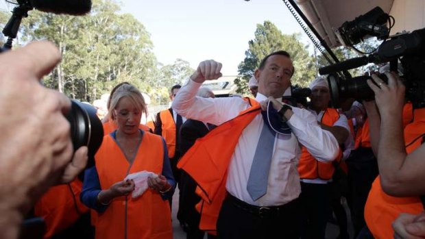 Opposition Leader Tony Abbott during his visit to a packaging business at Berkeley Vale on NSW's Central Coast.