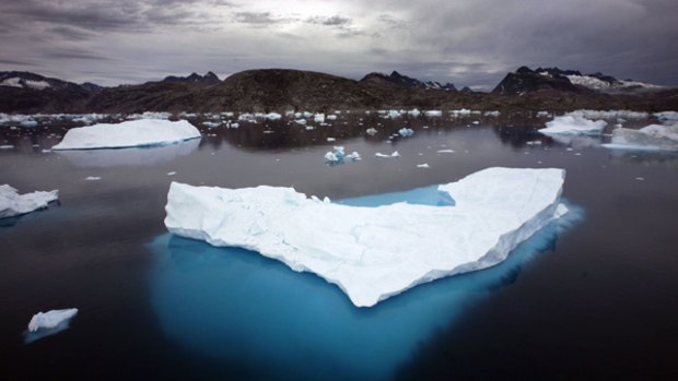 Icebergs float in a bay off Ammassalik Island, Greenland.