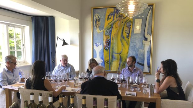 Vasse Felix's vertical tasting of its cabernet range at owner Paul Holmes a Court's (left) residence in Perth, with chief winemaker Virginia Willcock (right)  leading discussion.