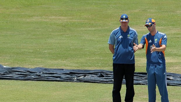 Trade secrets ... Michael Clarke chats with former cricket captain Greg Chappell.