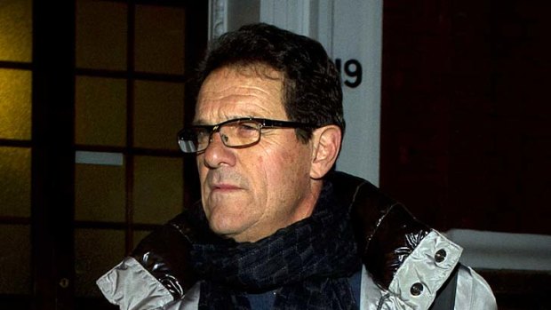 Fabio Capello leaves his central London home yesterday, a day after resigning as England manager.
