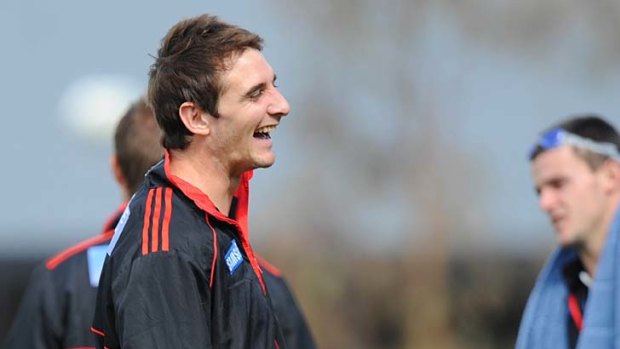 Winners are grinners: Jobe Watson at the Bombers' recovery session yesterday.