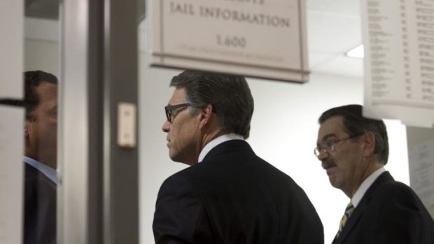 Texas Governor Rick Perry is booked at the criminal justice centre in Austin.