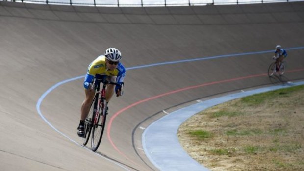 Paralympian Paul Kennedy tests out the updated Narrabundah Velodrome on Monday. 