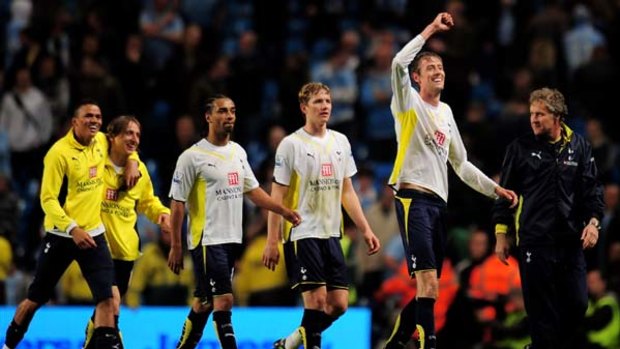 Goal hero ... Peter Crouch, second right, celebrates.