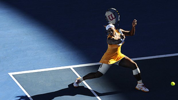 Serena Williams powers her way to victory over Samantha Stosur yesterday.