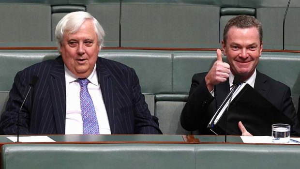 Changeable: Clive Palmer and government leader in the House of Representatives Christopher Pyne confer in the lower house.