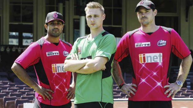 Out in the midday sun: English players Ravi Bopara and Michael Lumb of the Sydney Sixers flanking Melbourne Stars' Luke Wright.